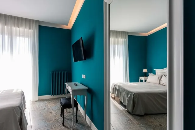 غرفة عائلية بسرير كوين وسريرين منفصلين بإطلالة على البحيرة، Hotel Ventaglio 4/7