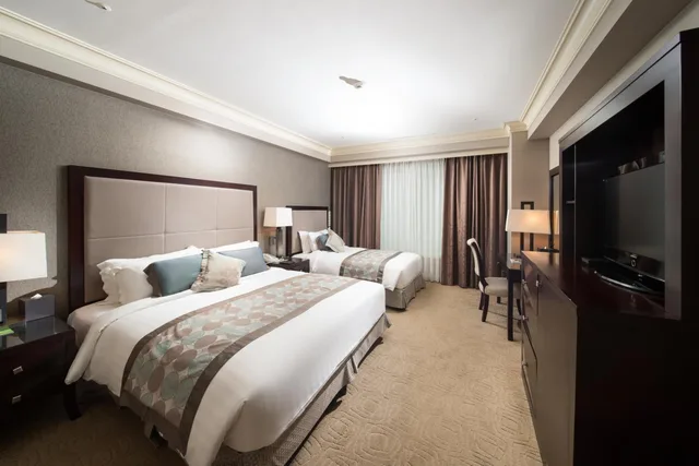 غرفة ديلوكس عائلية بسرير كينج وسرير فردي، Jeju Sun Hotel and Casino 2/2