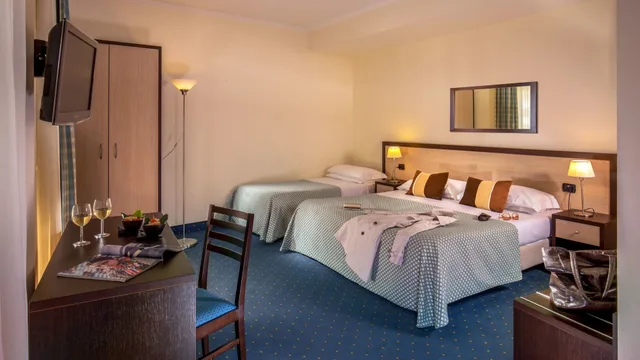 غرفة ثلاثية بسرير مزدوج وسرير فردي، Resort La Rocchetta 3/4