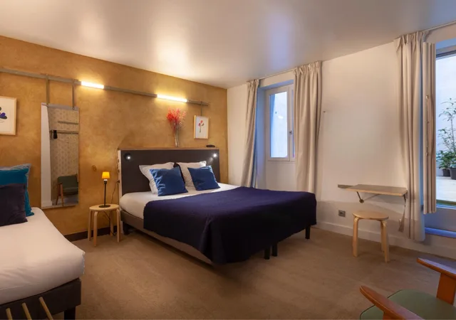 غرفة ثلاثية بسرير كينج وسرير فردي، Hotel La Nouvelle Republique & Hammam 1/2