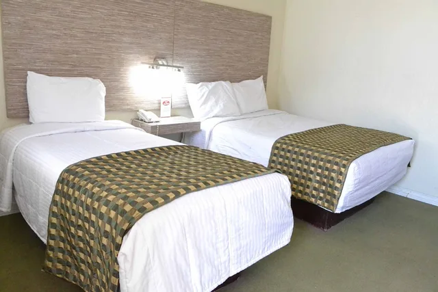 غرفة قياسية بسرير مزدوج وسرير فردي، Hotel Flamingo Juarez 8/9