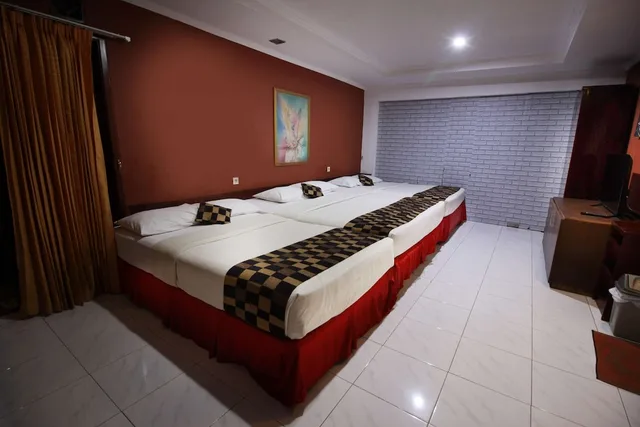 غرفة عائلية بسريرين كوين، Fora Guest House Taman Lingkar 1/3