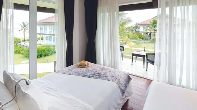 جناح جونيور سوبيريور بسرير كينج بإطلالة على الحديقة، ROBINSON Nam Hoi An 1/4