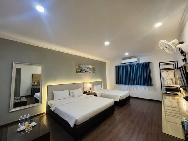 غرفة ديلوكس عائلية بسرير مزدوج وسرير فردي، A25 Hotel - 35 Mac Thi Buoi 1/2