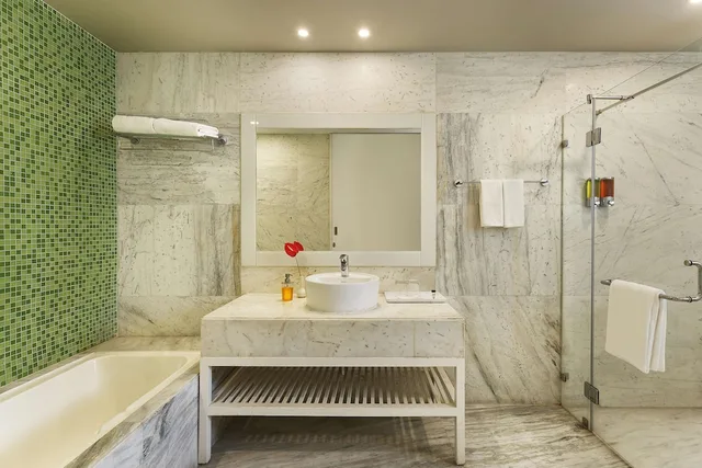 Deluxe, 1 Double and 1 Single Bed, Balcony, Sarovar Portico Outer Ring Road Bengaluru 5/6