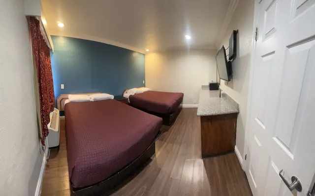 غرفة ديلوكس بسريرين كوين، Harris Motel 1/5