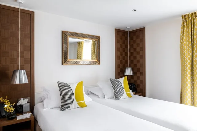 غرفة بسريرين منفصلين، Hotel Le Colisee 1/9