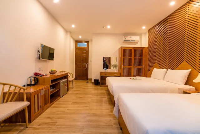 Deluxe, Triple, 1 King and 1 Single Beds, City View, Balcony, Phong Phu Villa Hoi An 2/6