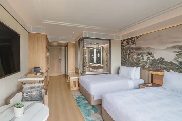 غرفة فاخرة بسريرين منفصلين بإطلالة على الفناء بشرفة، JW Marriott Goa Vagator 6/10