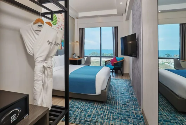 غرفة ديلوكس بسرير كوين، Mercure Mactan Cebu 5/6