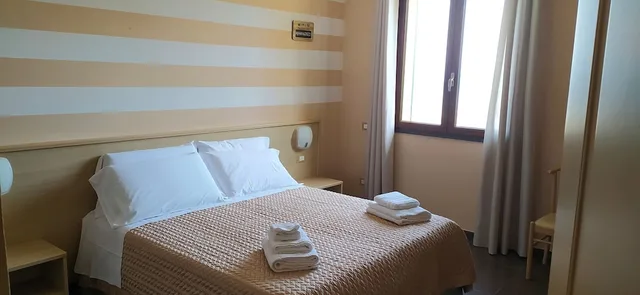 غرفة بسريرين مزدوجين بإطلالة على البحر، La Pietra 5/5
