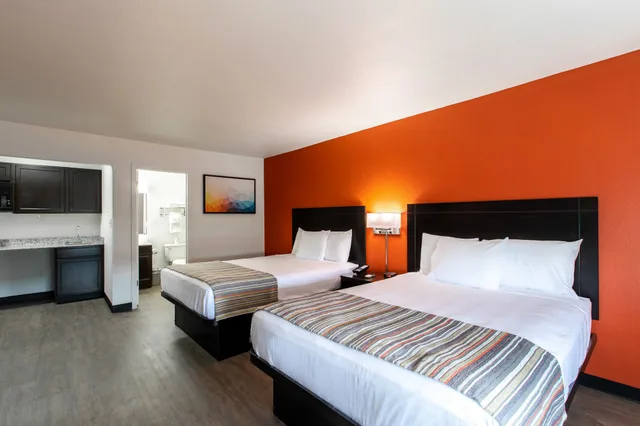 غرفة ديلوكس بسريرين كوين بمطبخ صغير، Suburban Studios Spartanburg - I-26 1/10