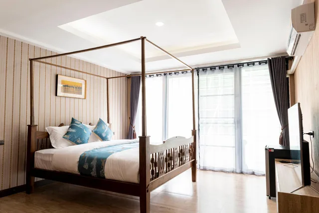 غرفة ديلوكس بسرير مزدوج بشرفة، A Lanna Boutique House 1/2