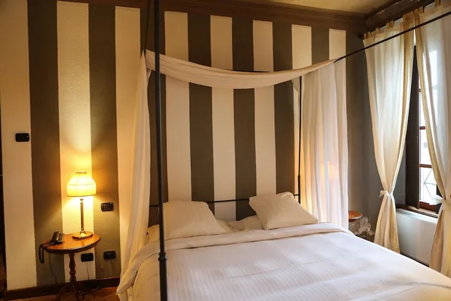 غرفة كلاسيكية ثلاثية بسرير مزدوج وسرير فردي، Hotel Tenimento Al Castello 2/7