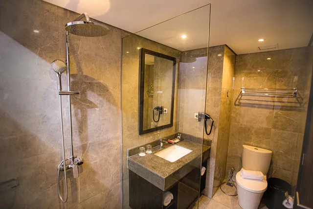 غرفة ديلوكس بسريرين منفصلين للمدخنين، Hotel Suni Abepura 2/2