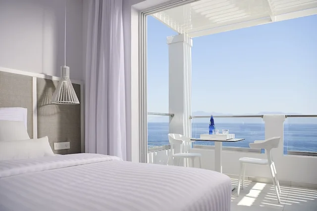 جناح بريميوم جونيور بسرير كوين بإطلالة على البحر مع أريكة، Dimitra Beach Hotel and Suites 2/4