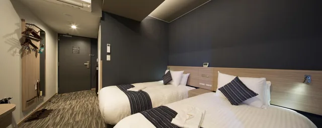 غرفة قياسية مفردة بسريرين منفصلين، Shizutetsu Hotel Prezio Hakata-Ekimae 1/5