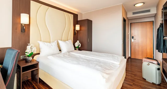 غرفة قياسية بسرير كوين بإطلالة على البحر، PLAZA Hotel Fohr am Bodensee 3/9