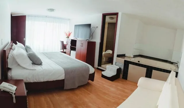 جناح بسرير كينج بجاكوزي، Nogal Suite Hotel Pasto 6/9