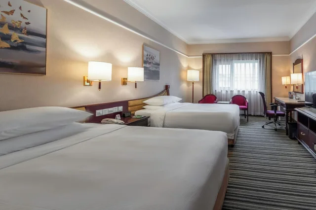 غرفة قياسية بسريرين مزدوجين مع دخول صالة النادي، Metropark Lido Hotel 1/4