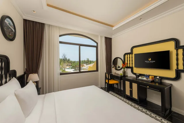 غرفة ديلوكس بسرير مزدوج، Nesta Hoi An Resort and Spa 1/4