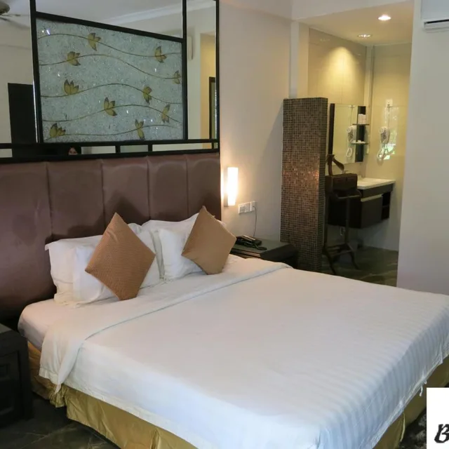 غرفة ديلوكس بسرير مزدوج أو سريرين منفصلين بإطلالة على الحديقة، Beringgis Beach Resort Spa 1/4