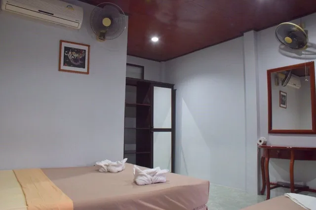 غرفة قياسية بسرير مزدوج وسرير فردي، Pen S Bungalow 7/10