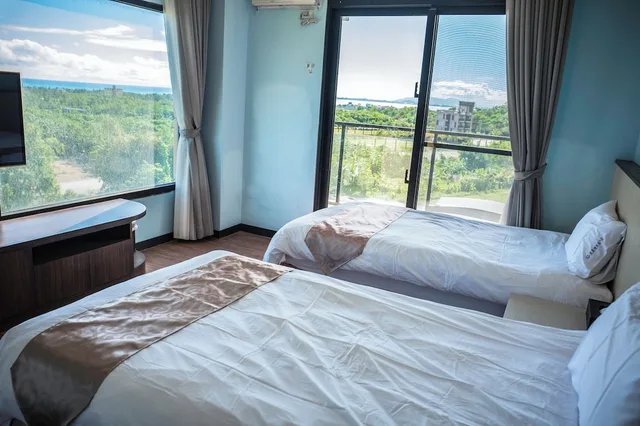 غرفة فاخرة بسريرين منفصلين بشرفة، Starry Inn 1/10