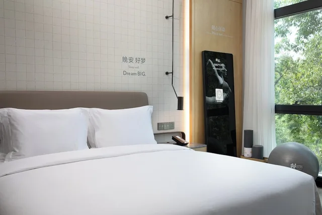 غرفة بريميوم بسرير كينج بإطلالة على المدينة، Even Hotels Shenzhen Nanshan 3/7
