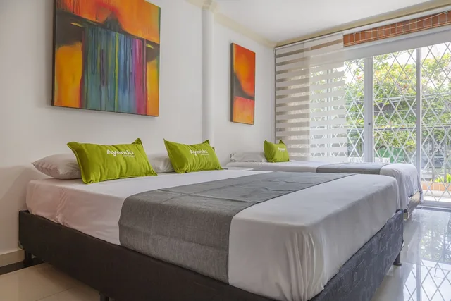 غرفة قياسية ثلاثية بسرير مزدوج وسرير فردي، Ayenda 1258 Boutique Laureles Home 1/10
