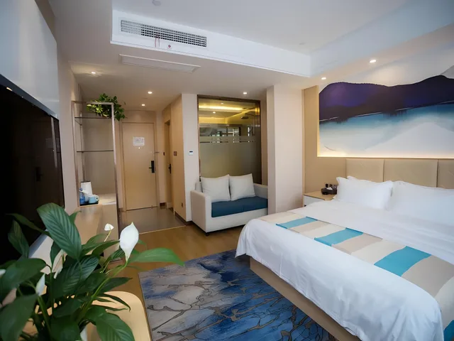 غرفة ديلوكس بسرير كينج وسرير كوين، VX Heze Dingtao District Taoyi Road Hotel 2/2