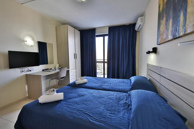 غرفة أساسية ثلاثية بسرير فردي، Relax Inn Hotel 1/1