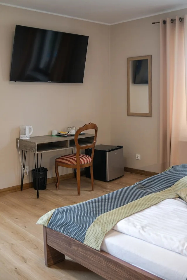 غرفة ديلوكس بسرير كوين وسرير فردي مع أريكة، Royal Residence 3/3
