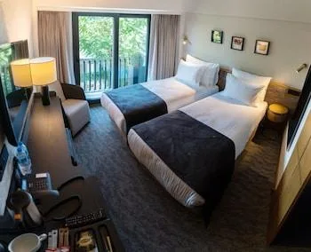 غرفة عائلية بغرفتين بإطلالة جزئية على البحر، Meg Hotel 1/1