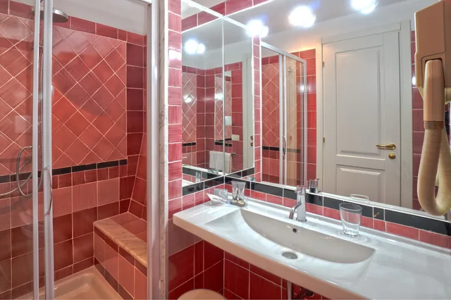 جناح جونيور بسرير كوين وسرير فردي بإطلالة على البحر، GRAND HOTEL SAN PIETRO 3/4