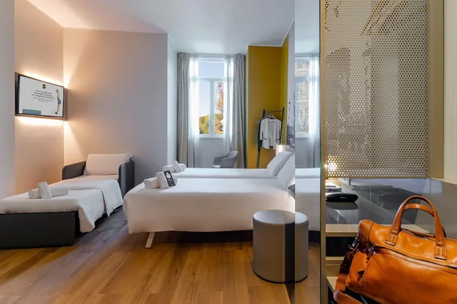 غرفة قياسية ثلاثية بسرير كوين وسرير فردي، B B Hotel Roma Pietralata 5/10