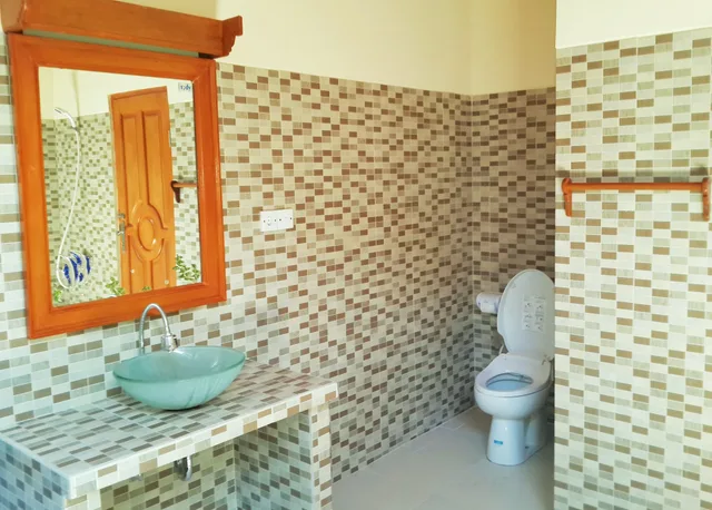 بنغل بسرير كينج بإطلالة على الحديقة، Geringsing Bungalows 4/7