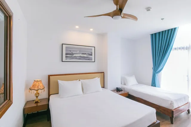 Deluxe, Triple, 1 King and 1 Single Beds, City View, Pool Access، Ritzy Boutique Hotel Da Nang 2/10