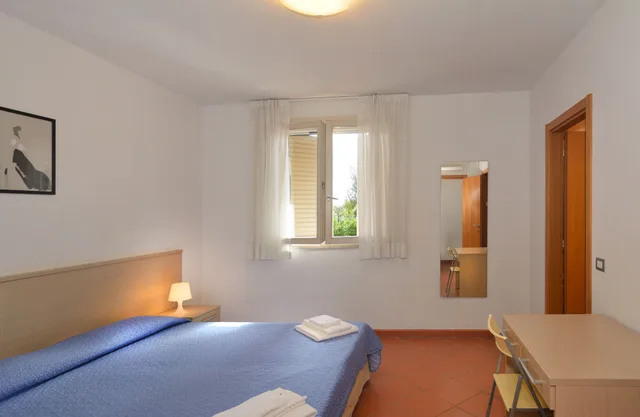 شقة بسريرين منفصلين وسرير كوين بغرفتي نوم مع أريكة، Residence San Rossore 4/8