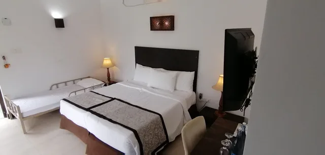 غرفة ثلاثية بسرير كينج وسرير فردي، Amaluna Resorts 2/6