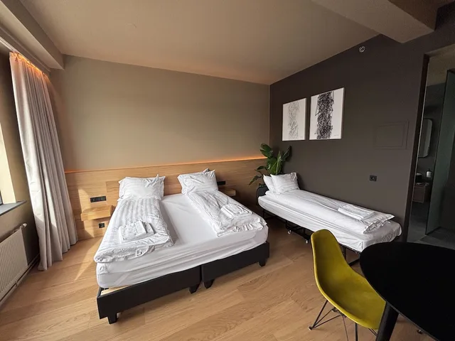 Standard, Triple, 1 Double and 1 Single Bed, Arctic Comfort Hotel 1/8