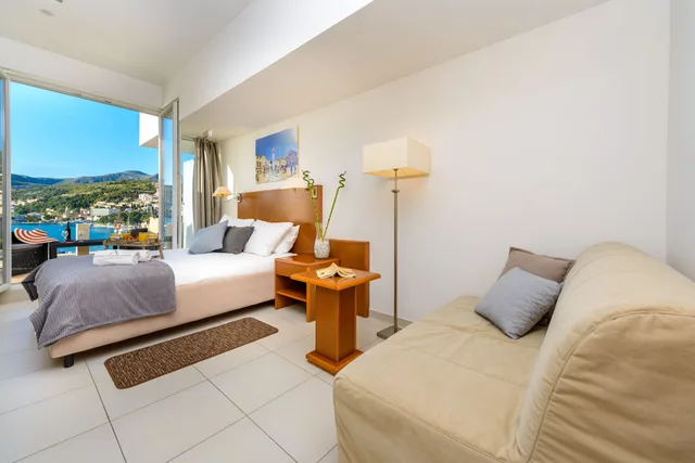 استوديو بسرير كوين بإطلالة على البحر بشرفة مع أريكة، Adriatic Deluxe Apartments 1/3
