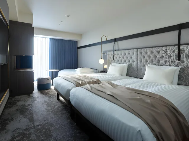 غرفة سوبيريور ثلاثية بسريرين مع سرير إضافي بحوض استحمام، Mitsui Garden Hotel Sapporo West 1/1
