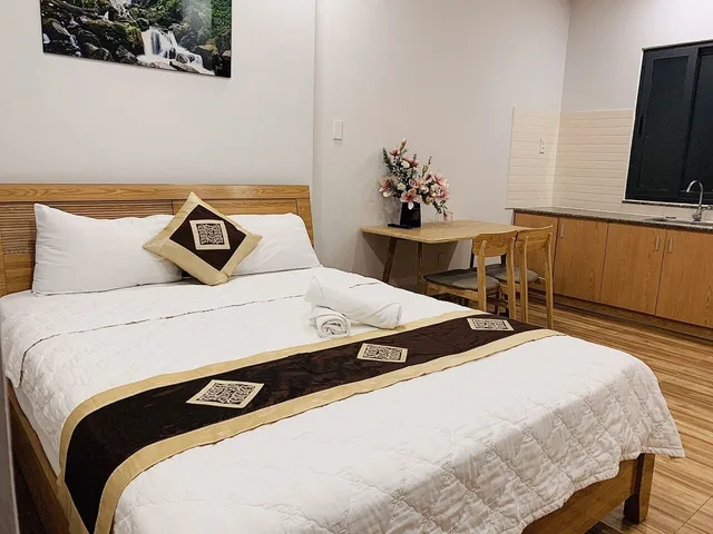 غرفة ديلوكس بسرير كوين، The Lumiere Hotel 1/4