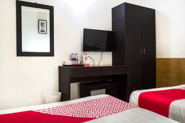 جناح عائلي بسريرين مزدوجين، SUPER OYO Capital O 664 Romance Hotel 3/4