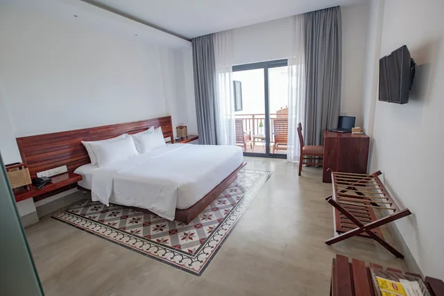غرفة ديلوكس بسرير كينج بإطلالة على المسبح، DACO Hotel 5/10
