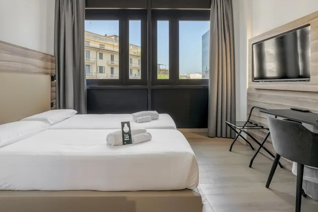 غرفة قياسية بسريرين منفصلين، B&B HOTEL Prato City Center 5/7