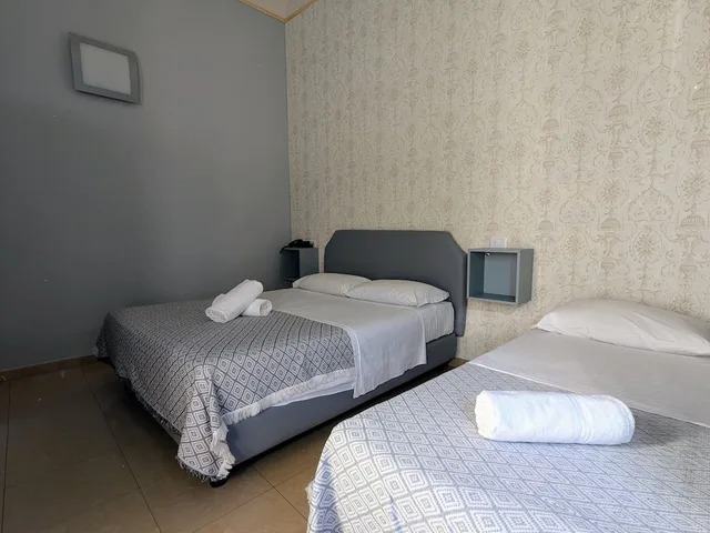 غرفة ثلاثية بسرير مزدوج وسرير فردي، Hotel Soggiorno Athena 2/10