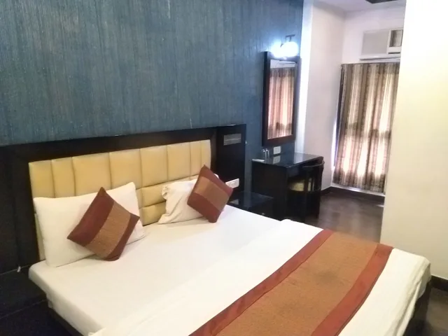 غرفة ديلوكس بسرير كينج، Arihant Inn 1/6