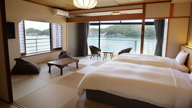 غرفة يابانية قياسية بسريرين منفصلين بإطلالة على البحر، Yukai Resort Premium Koshinoyu 1/1